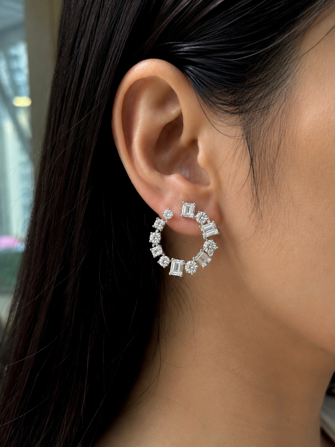Aurelia Crystal Orbit Hoop Earrings worn on ear