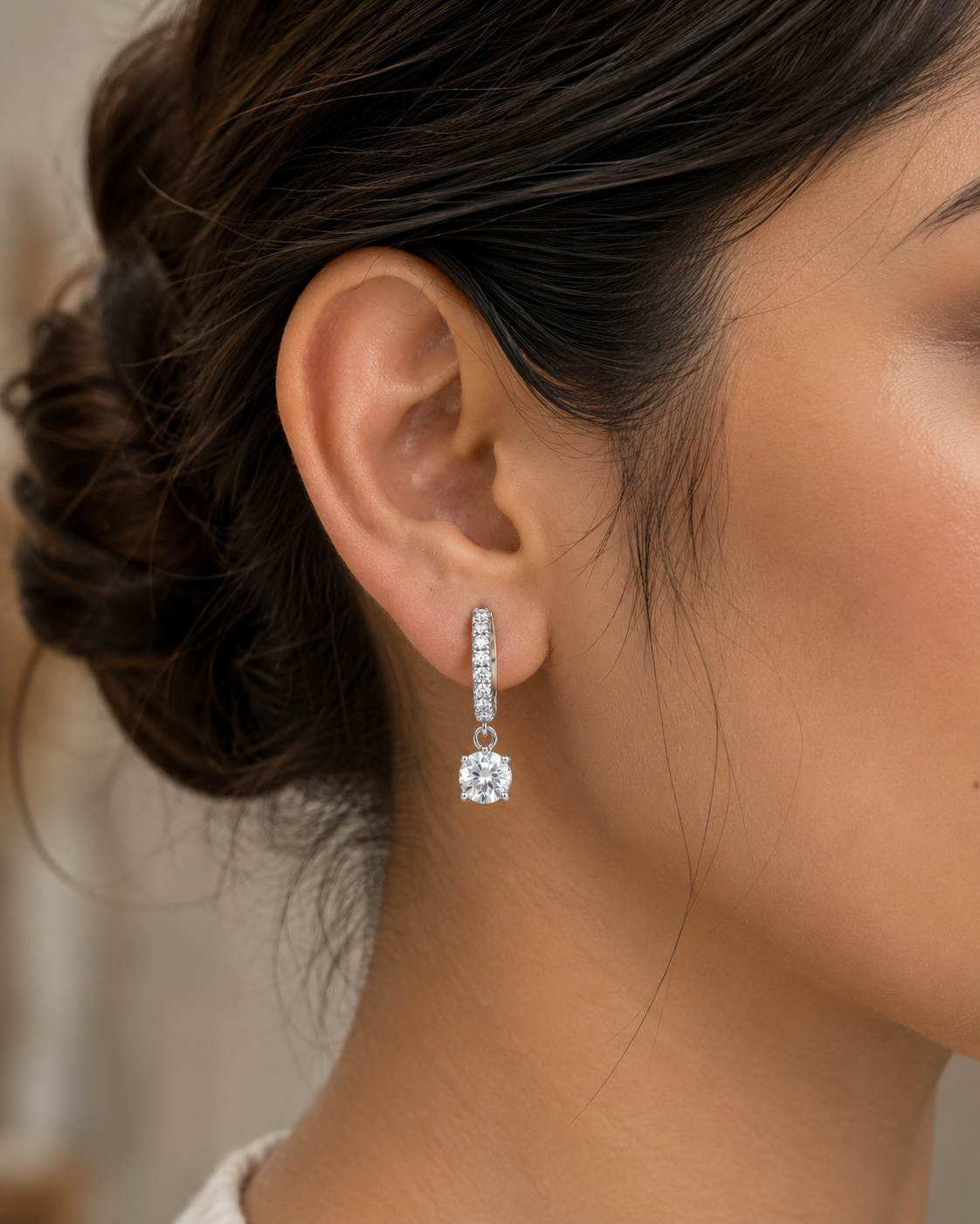 Solène Crystal Drop Huggie Earrings detail view