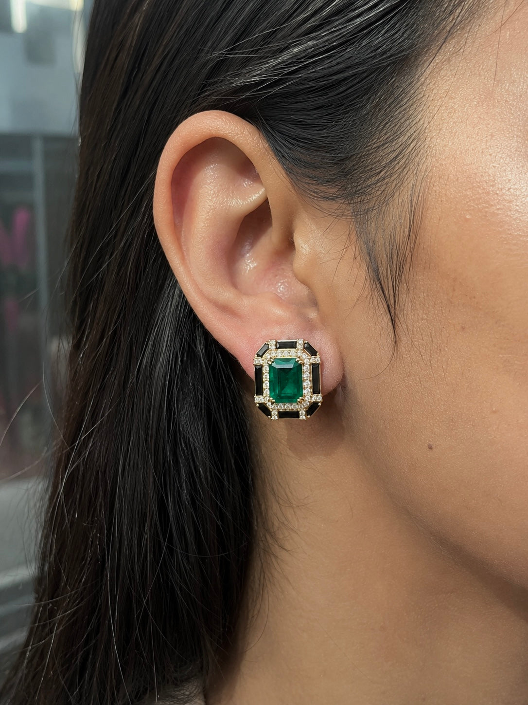 Emerald Noir Statement Stud Earrings worn on ear