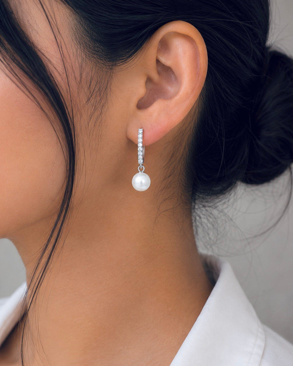 Lumière Pearl Huggie Earrings detail view