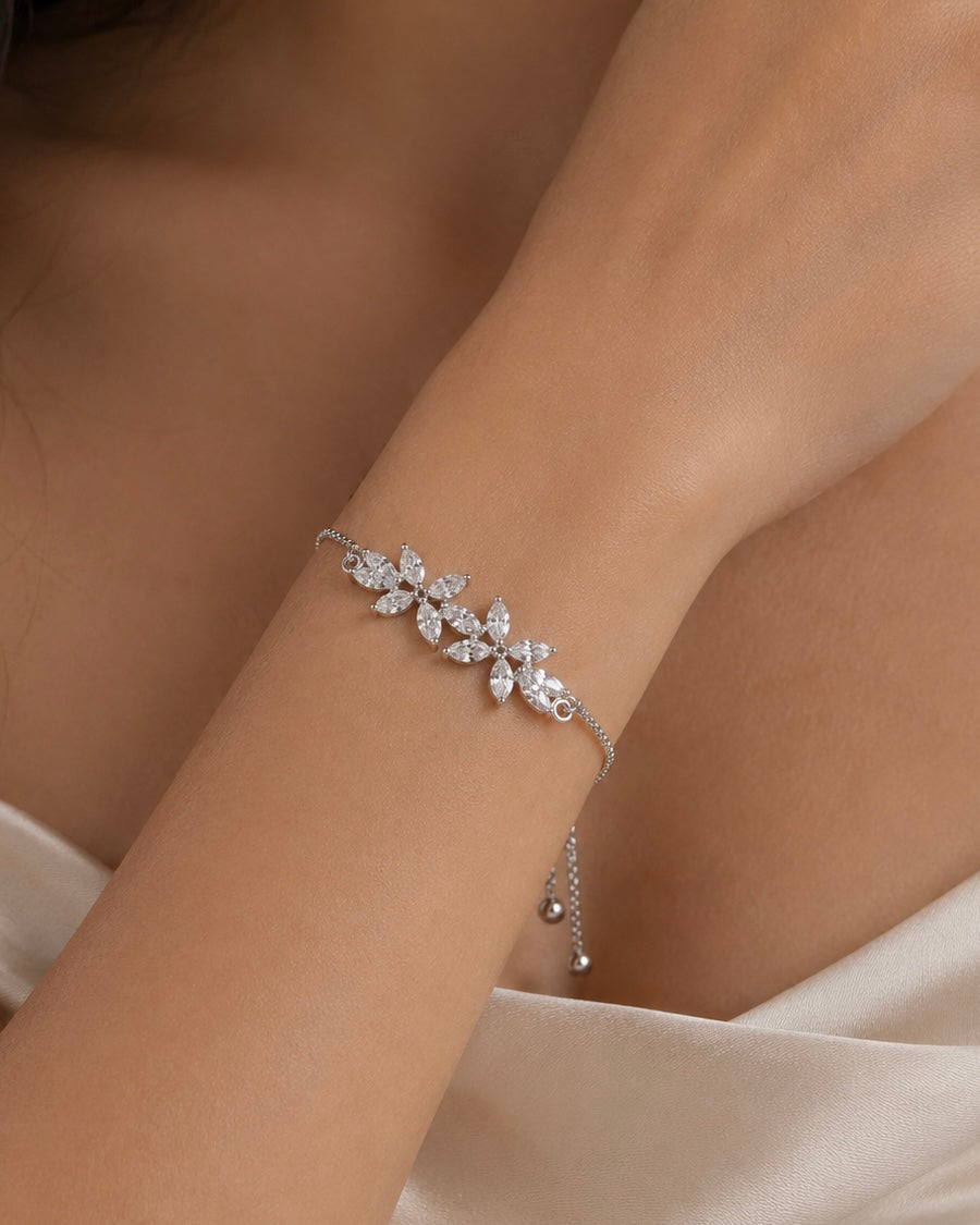 Mira Silver Floral Adjustable Bracelet worn on wrist